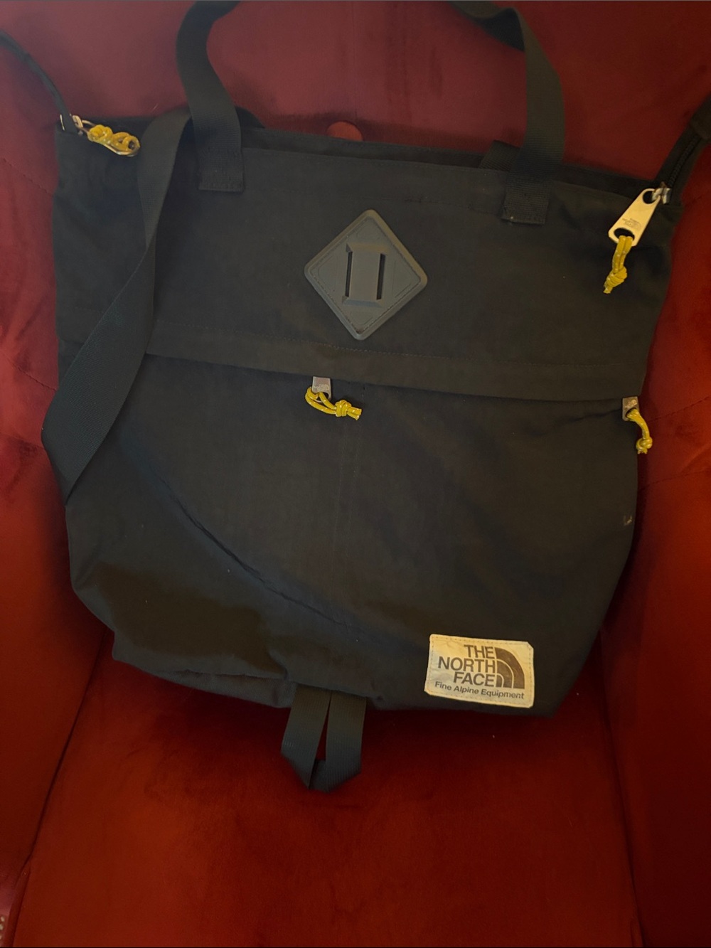 The North Face Black Messenger Tote with Yellow Pulls